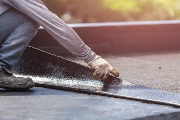 Professional Basement Waterproofing technician working in Harrisburg, NC